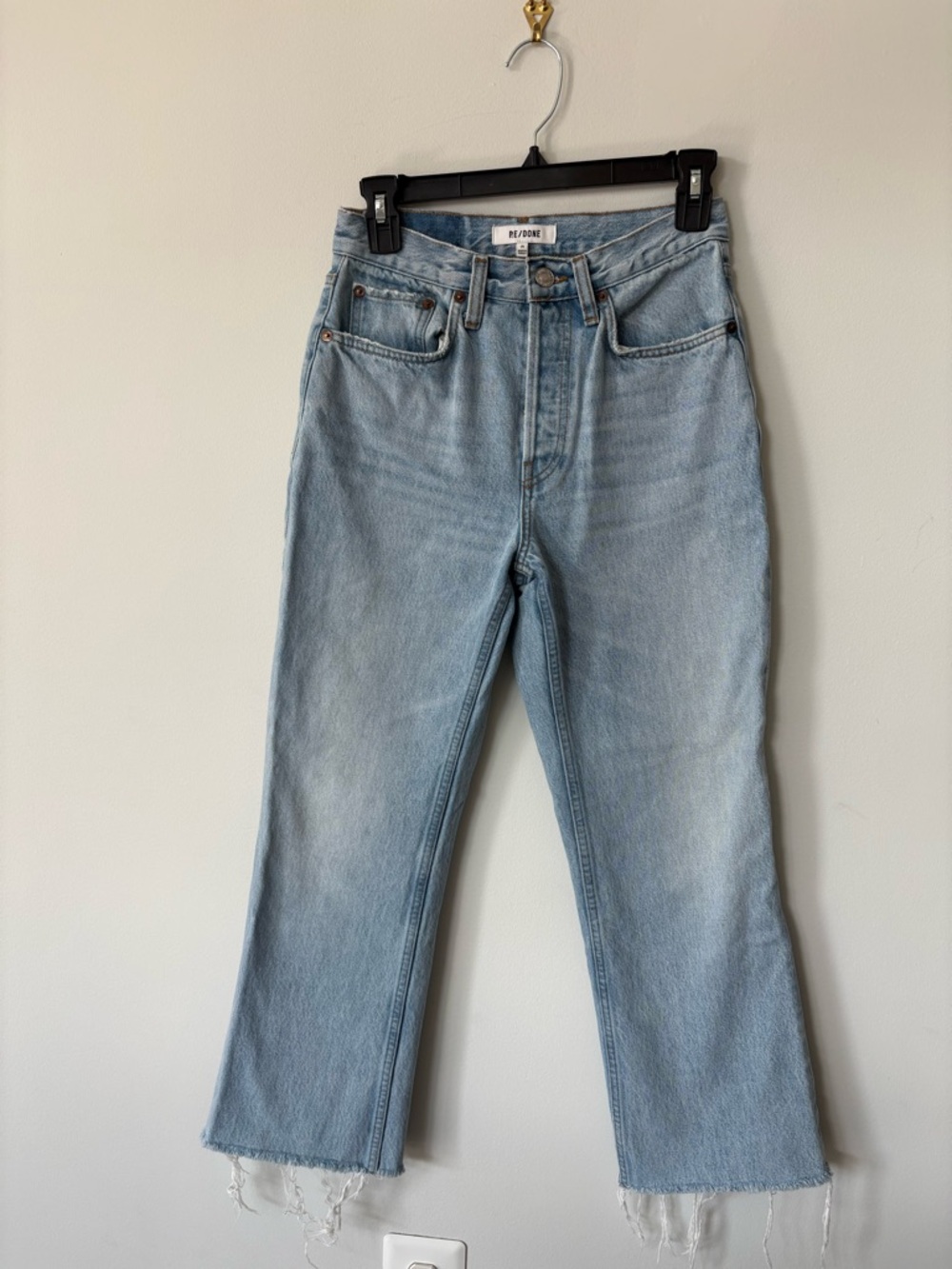 Re/Done 70’s bootcut raw hem light wash jeans 25
